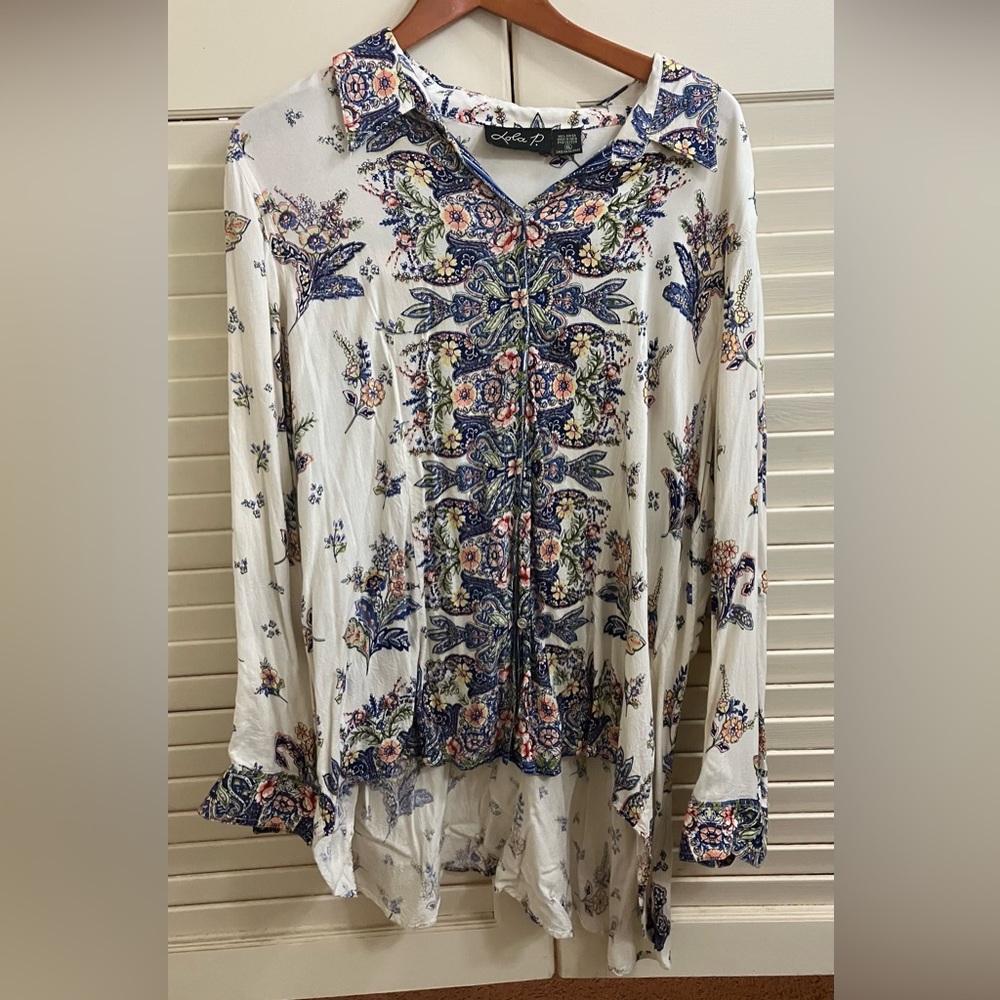 Asymmetrical, button up shirt.